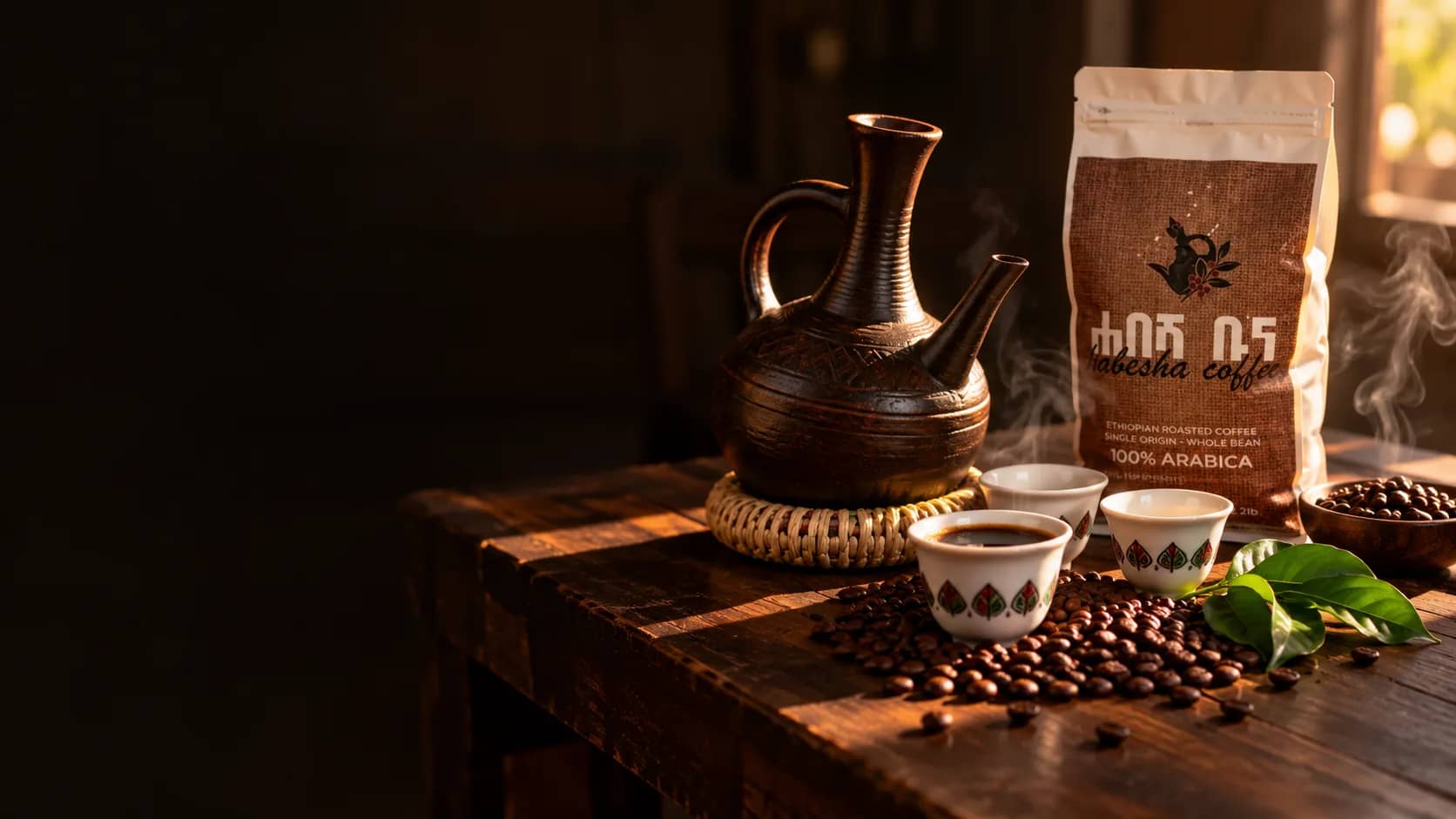 A traditional Ethiopian jebena, cups of coffee and a bag of Habesha Coffee on a wooden table